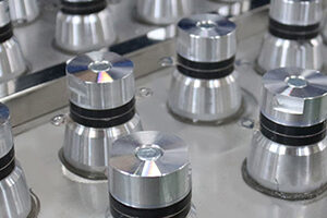 超声波清洗机与高压喷淋清洗机的区别